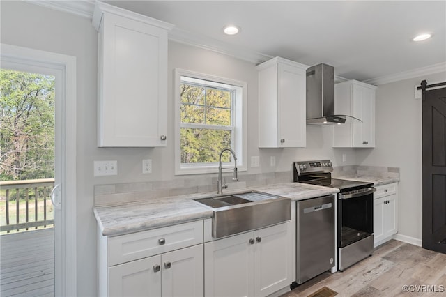 0 Union Church Rd, Palmyra, VA 22963 - kitchen with a sink, stainless steel appliances, wall chimney range hood, a barn door, and white cabinets