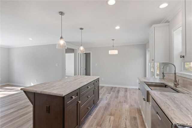 0 Union Church Rd, Palmyra, VA 22963 - kitchen featuring a sink, light wood-style flooring, baseboards, and dark brown cabinets