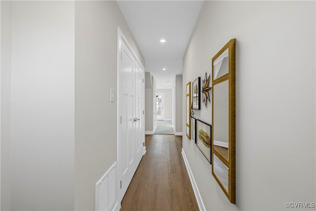 1255 Lazy River Rd, Chesterfield, VA 23114 - hallway featuring dark wood finished floors, visible vents, baseboards, and recessed lighting