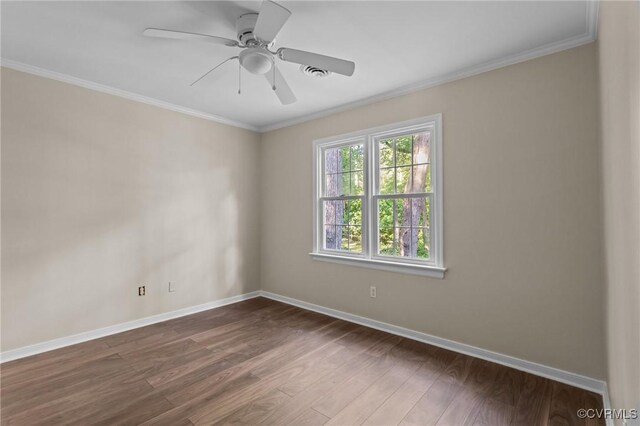 unfurnished room featuring dark wood-type flooring, baseboards, crown molding, and ceiling fan