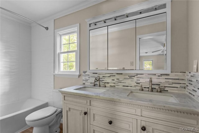 full bathroom with toilet, decorative backsplash, double vanity, ornamental molding, and  shower combination