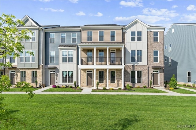12147 Morning Walk, Henrico, VA 23233 - townhome / multi-family property with a front lawn, brick siding, and a balcony
