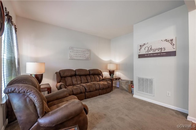 living area with carpet flooring and baseboards