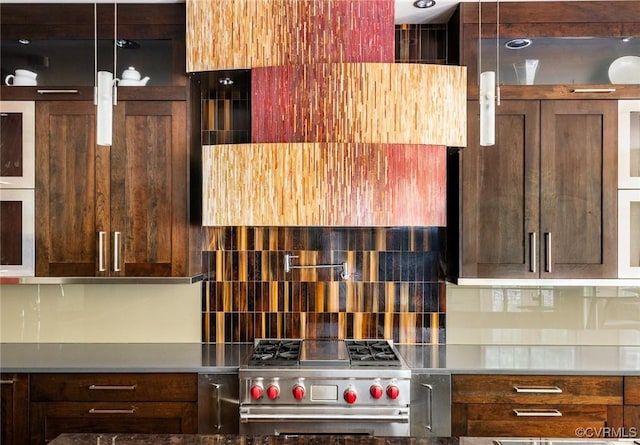 kitchen with high end stove and backsplash