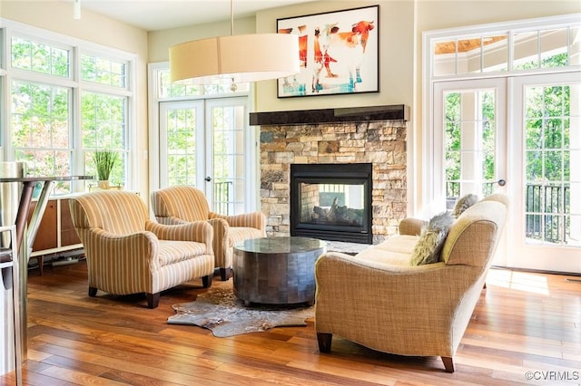interior space featuring a wealth of natural light, french doors, and visible vents