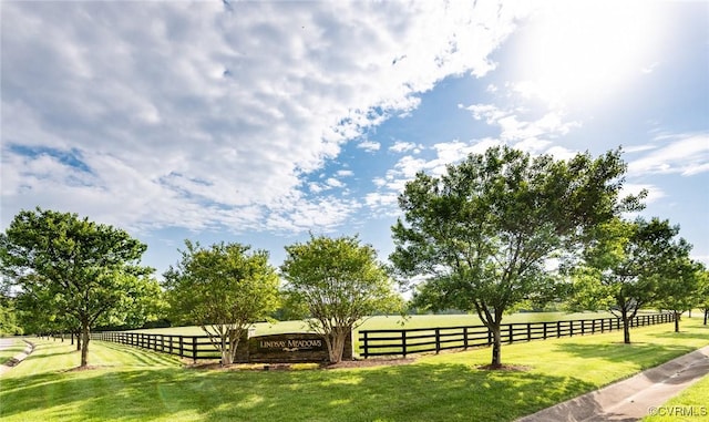 exterior space with a yard and fence