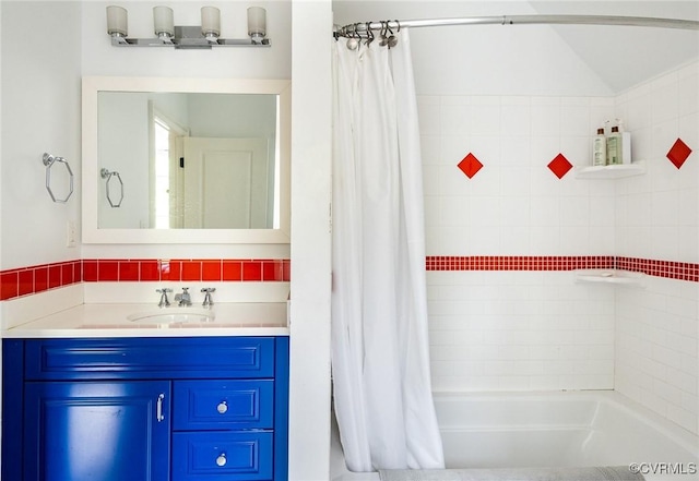 full bath featuring vanity and shower / bath combination with curtain
