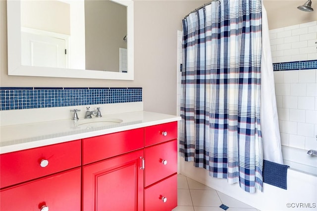 full bathroom featuring shower / bath combination with curtain, tile patterned flooring, and vanity