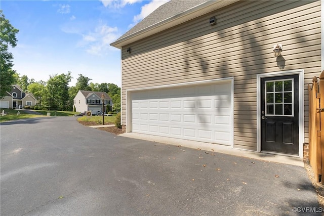 garage with driveway