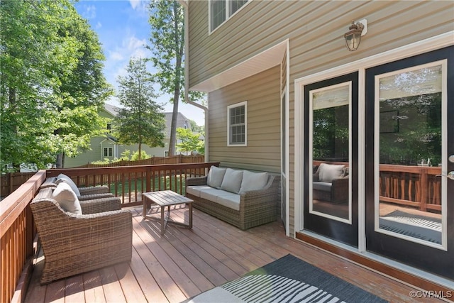 deck featuring an outdoor hangout area and fence