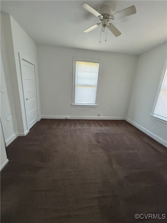 2307 Wright Ave, Richmond, VA 23224 - unfurnished room featuring dark colored carpet and a ceiling fan