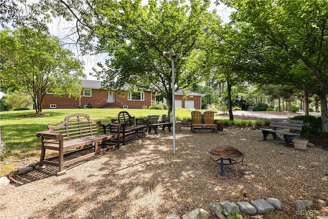 4916 Breckstone Pl, North Chesterfield, VA 23234 - view of community with an outdoor fire pit and a lawn