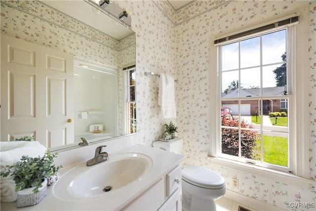 4916 Breckstone Pl, North Chesterfield, VA 23234 - bathroom featuring wallpapered walls, healthy amount of natural light, toilet, and vanity