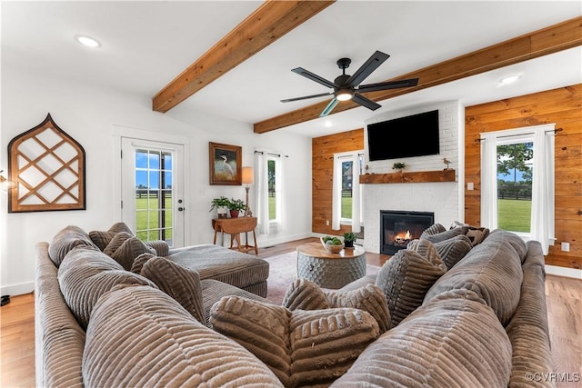 3307 Colston Ct, Powhatan, VA 23139 - living room featuring a ceiling fan, a fireplace, light wood-type flooring, baseboards, and recessed lighting