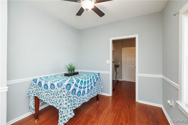 bedroom featuring wood finished floors, ceiling fan, and baseboards