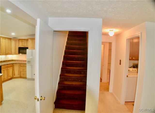stairs featuring recessed lighting, a textured ceiling, and carpet floors