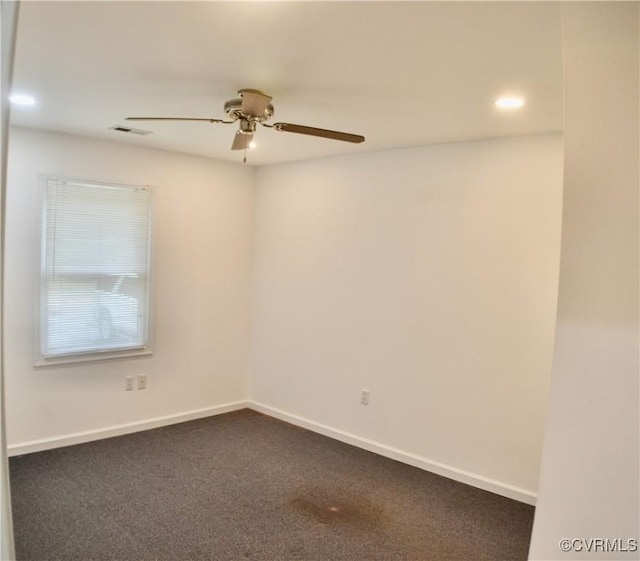 carpeted spare room featuring a ceiling fan, recessed lighting, baseboards, and visible vents