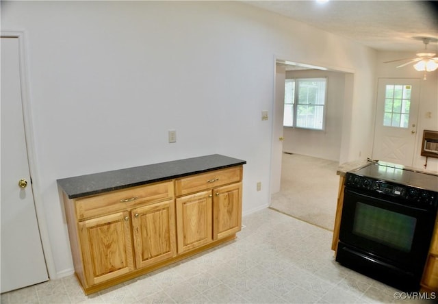 kitchen with ceiling fan, light carpet, baseboards, and black range with electric stovetop