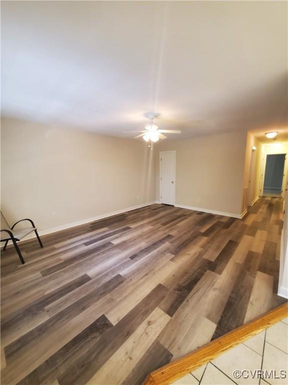349 Whispering Pine Ln, Bumpass, VA 23024 - unfurnished room with a ceiling fan, baseboards, and wood finished floors