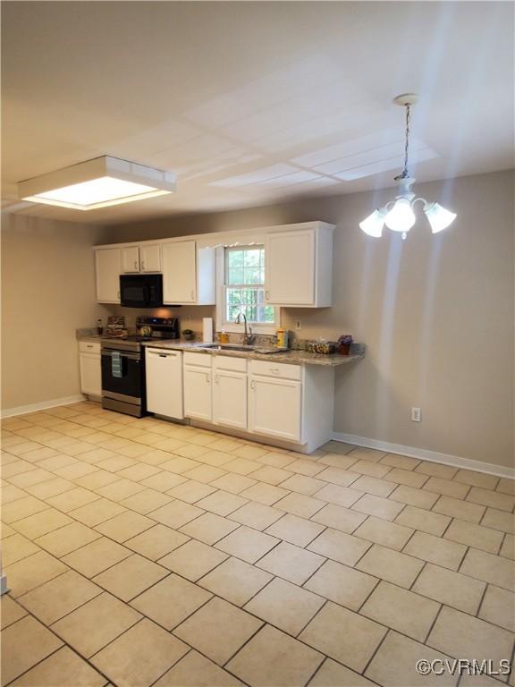 349 Whispering Pine Ln, Bumpass, VA 23024 - kitchen featuring electric range, black microwave, dishwasher, and baseboards
