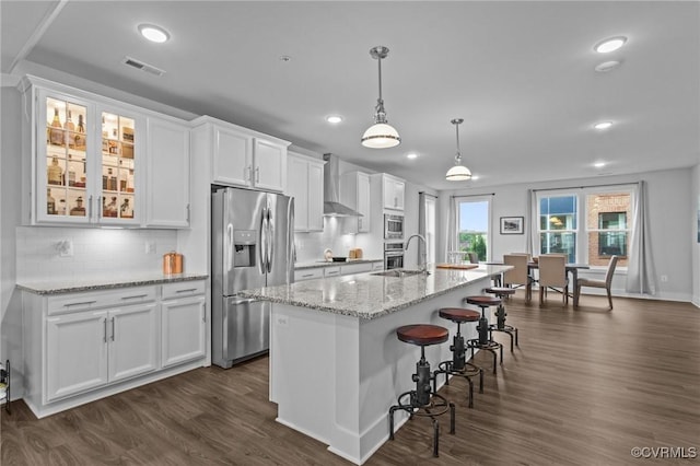 6 Flatwater Row Unit B, Henrico, VA 23231 - kitchen with appliances with stainless steel finishes, recessed lighting, white cabinetry, decorative backsplash, and dark wood-type flooring