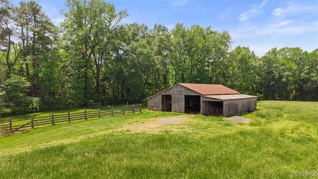 33356 Richmond Tpke, Hanover, VA 23069 - view of yard featuring an exterior structure, an outdoor structure, and a forest view