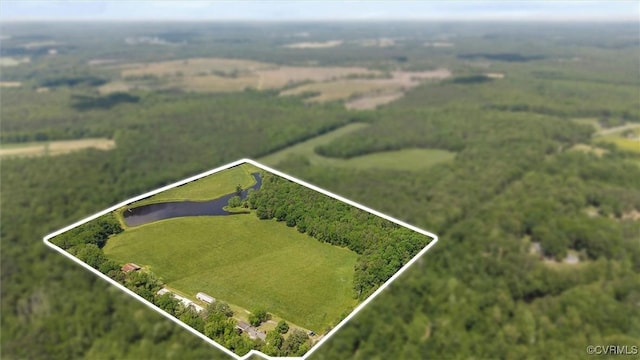 aerial view of property's location with property boundaries highlighted and a large body of water