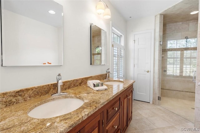 33356 Richmond Tpke, Hanover, VA 23069 - bathroom with a shower stall, double vanity, recessed lighting, and tile patterned flooring