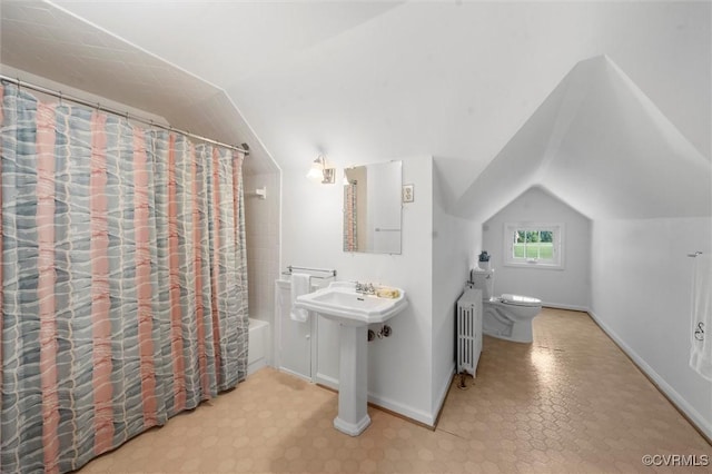 33356 Richmond Tpke, Hanover, VA 23069 - bathroom featuring toilet, radiator, lofted ceiling, shower / bathtub combination with curtain, and baseboards