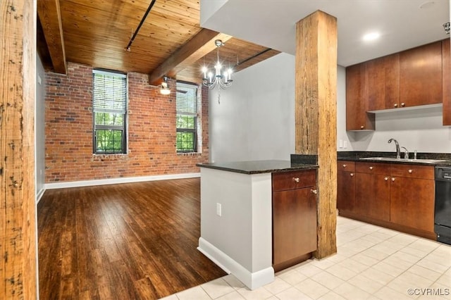 251 Rocketts Way Unit 204, Henrico, VA 23231 - kitchen with brick wall, a sink, baseboards, wood ceiling, and beam ceiling