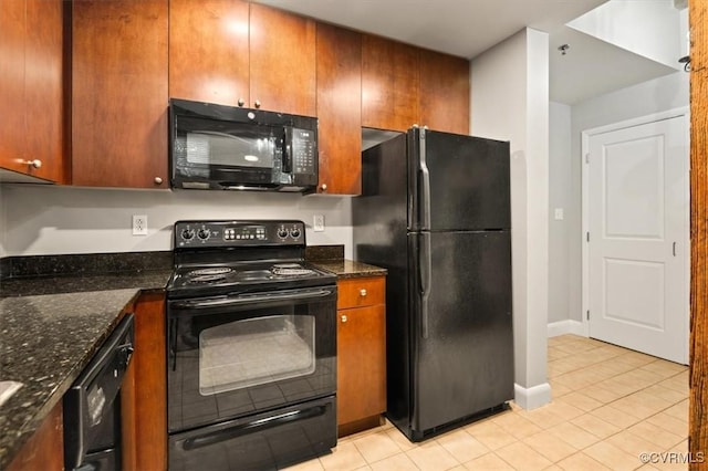 251 Rocketts Way Unit 204, Henrico, VA 23231 - kitchen with black appliances, light tile patterned floors, dark stone countertops, baseboards, and brown cabinets