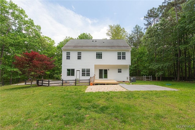 251 Ivy Glen Ln, Bumpass, VA 23024 - rear view of house with fence, a patio, and a lawn