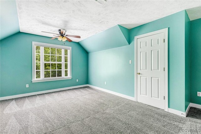251 Ivy Glen Ln, Bumpass, VA 23024 - additional living space with carpet, vaulted ceiling, baseboards, and a ceiling fan
