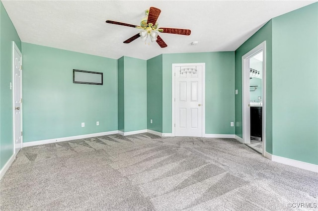 251 Ivy Glen Ln, Bumpass, VA 23024 - unfurnished bedroom featuring baseboards, ensuite bathroom, a ceiling fan, and carpet