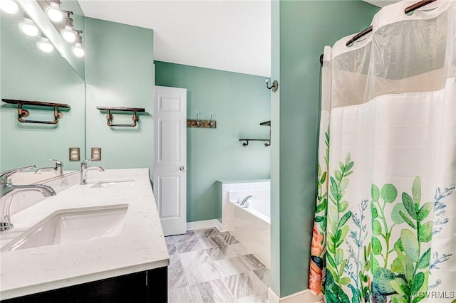 251 Ivy Glen Ln, Bumpass, VA 23024 - full bath featuring marble finish floor, a garden tub, double vanity, and a sink