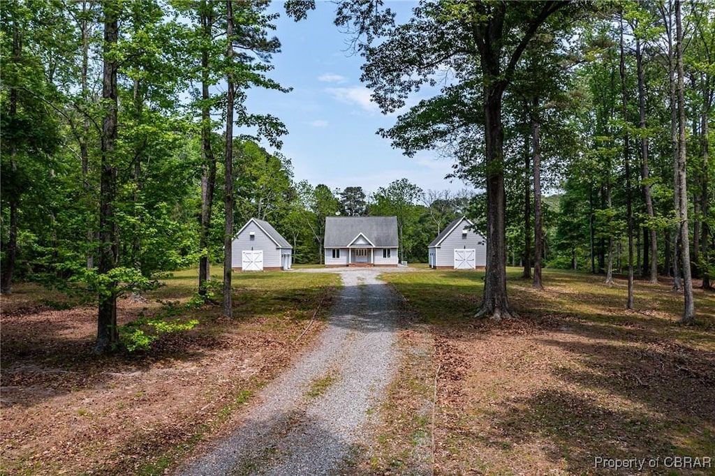 395 Scott Rd, White Stone, VA 22578 - view of front facade featuring an outdoor structure and dirt driveway