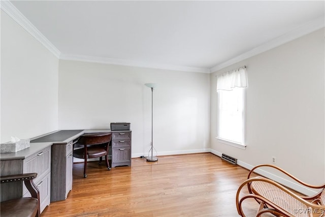 unfurnished office featuring crown molding, light wood-style flooring, baseboards, and visible vents