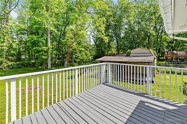 deck featuring a yard