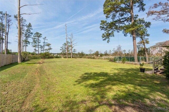 view of yard featuring fence