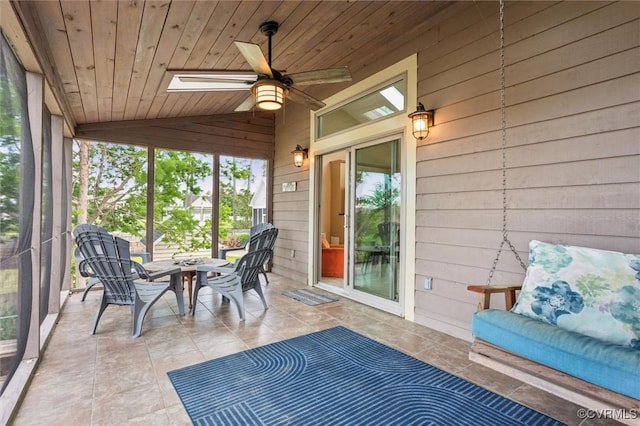 sunroom with a ceiling fan