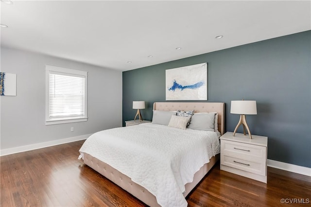 bedroom with recessed lighting, baseboards, and dark wood-style floors