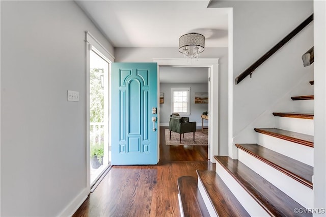 10102 Cherrywood Dr, Richmond, VA 23238 - foyer entrance with a chandelier, wood finished floors, and stairway