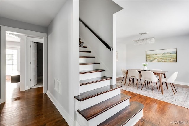 10102 Cherrywood Dr, Richmond, VA 23238 - stairway featuring wood finished floors and baseboards