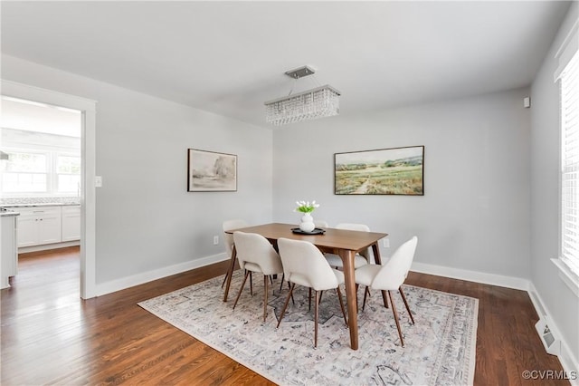 10102 Cherrywood Dr, Richmond, VA 23238 - dining room featuring dark wood-type flooring and baseboards