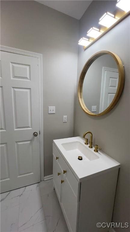 731 Wilson St, Petersburg, VA 23803 - bathroom featuring marble finish floors, vanity, and baseboards