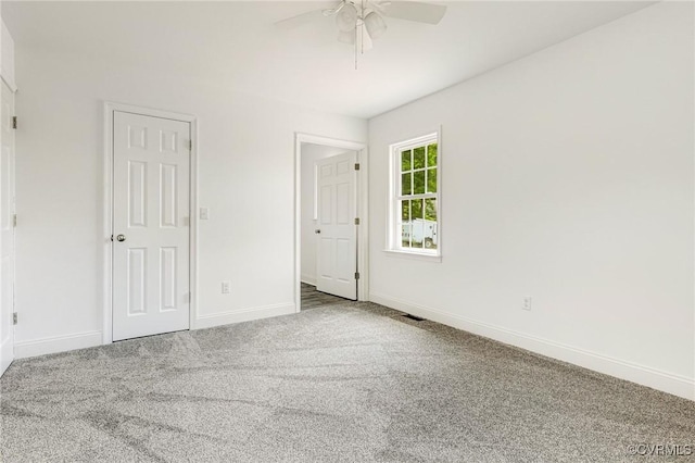 1684 Halls Store Rd, Mineral, VA 23117 - unfurnished bedroom featuring ceiling fan, carpet flooring, and baseboards