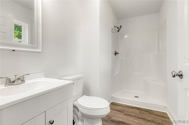 1684 Halls Store Rd, Mineral, VA 23117 - full bathroom with toilet, a shower, wood finished floors, and vanity