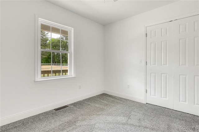 1684 Halls Store Rd, Mineral, VA 23117 - spare room with carpet, visible vents, and baseboards
