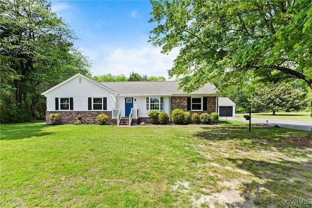 ranch-style home with driveway, brick siding, a front lawn, and an attached garage