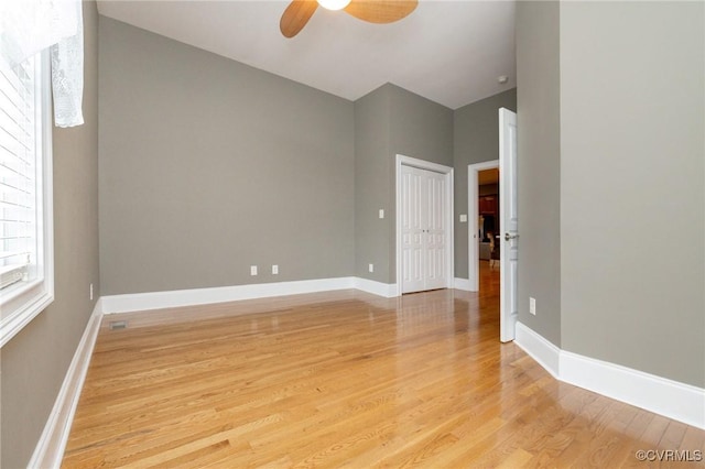405 Church St, Blackstone, VA 23824 - empty room featuring a ceiling fan, baseboards, and light wood finished floors